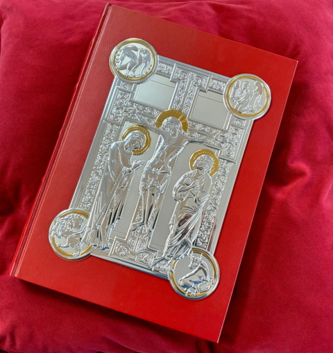 Book with a red leather binding